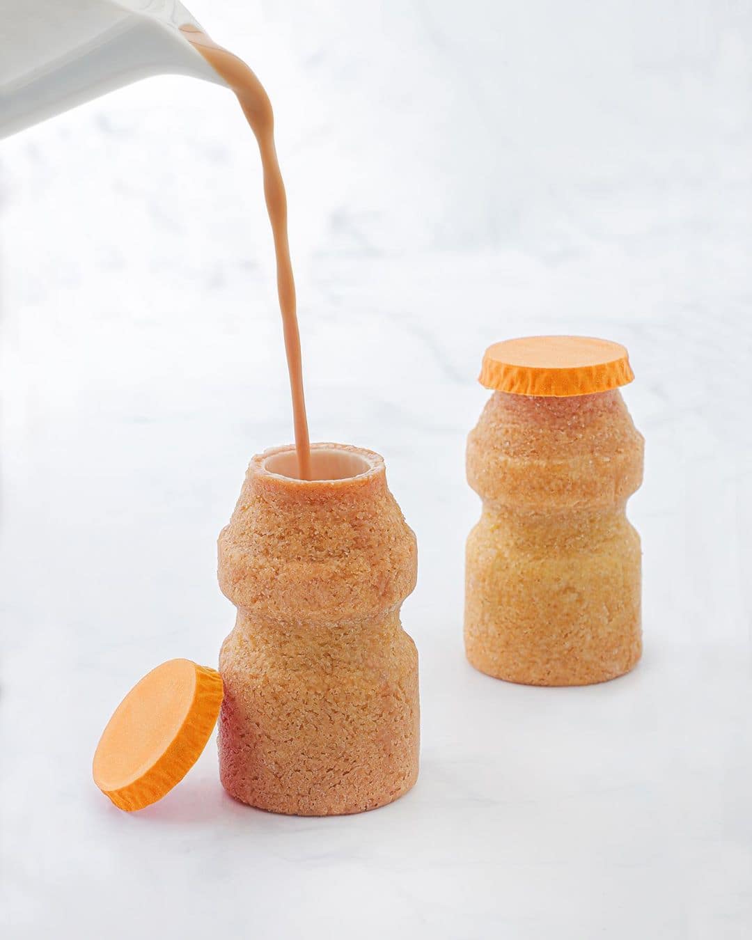 Milk Tea with Yakult-shaped cookies Milk Tea with Yakult-shaped cookies
