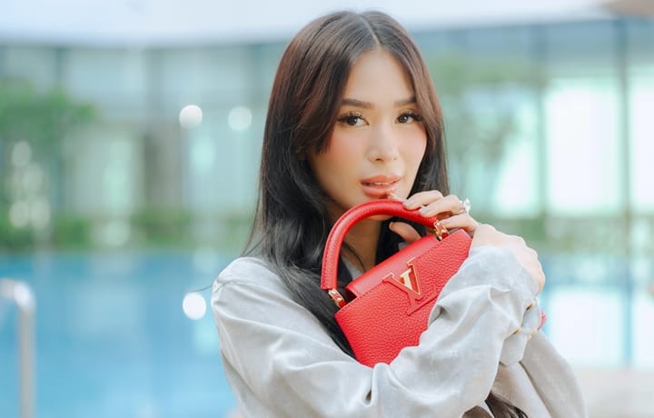 Heart Evangelista - This @louisvuitton moment⚡️I was smitten immediately  when I saw Maison's iconic initials on these LV Volt Play pieces! So happy  that I could style and stack them depending on