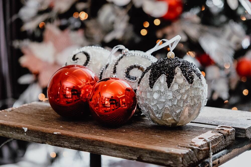 In the spirit of the season, Anton Barretto decorated a black Christmas tree with red and silver ornaments to give it just the right amount of festive sparkle. In the spirit of the season, Anton Barretto decorated a black Christmas tree with red and silver ornaments to give it just the right amount of festive sparkle.