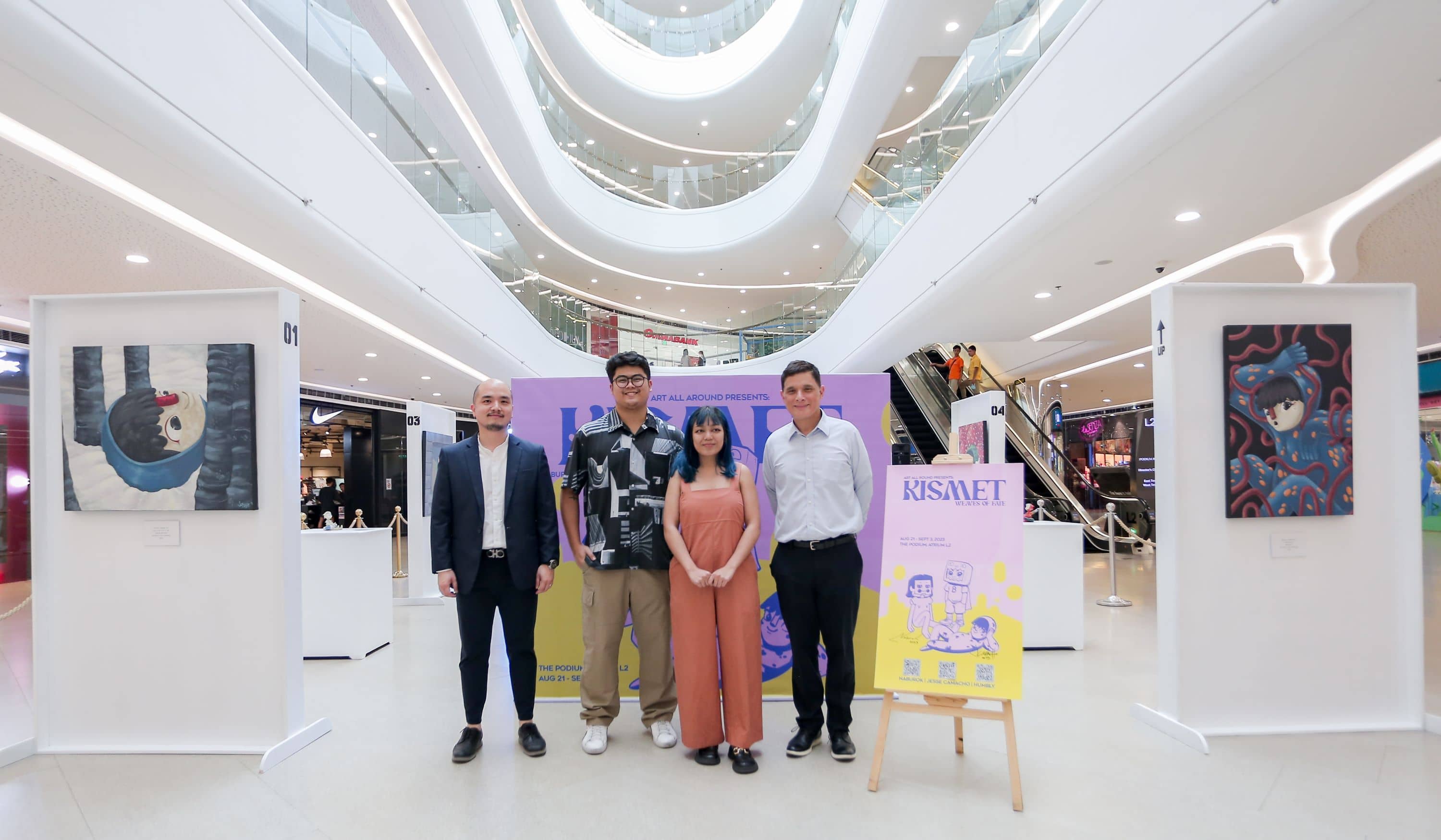 The Podium is featuring three new artists in a contemporary pop-up art exhibit entitled “Kismet: Weaves of Fate” that will run from August 21 to September 3 at the Atrium Level 2. Joining in the opening day are (2nd and 3rd from left) artists Jesse Camacho and Naburok with (extreme left and extreme right) The Podium’s Allan Jarantilla and Ian Mathay.
