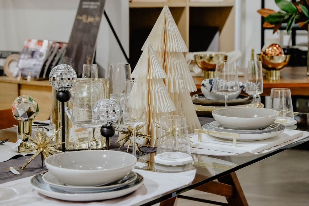 Get creative with the usual items you have in your arsenal of tabletop implements. Anton used candlesticks and jiggers by west elm as bases for ornaments in his table setting. Get creative with the usual items you have in your arsenal of tabletop implements. Anton used candlesticks and jiggers by west elm as bases for ornaments in his table setting.