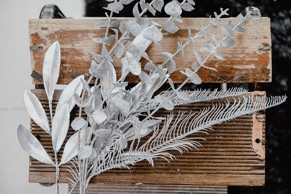 Silver foliage makes a black Christmas tree come to life. Silver foliage makes a black Christmas tree come to life.