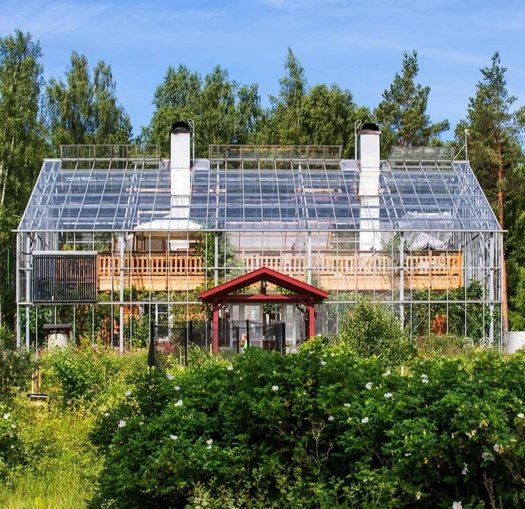 A Traditional Swedish Log Cabin Encased In A Green House Allows A Family To Live A Self-Sustaining Lifestyle Metro.Style picture